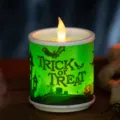 Decorative Halloween LED candle light featuring a green glow and Trick or Treat spooky design - Green Text / S