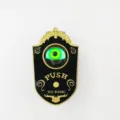 Timbre decorativo de Halloween con ojo verde brillante y función de botón para presionar - Timbre Negro