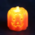 Vibrant glowing orange LED pumpkin night light for spooky Halloween table decoration - Triangle Eyes Pumpkin Light
