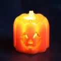 Glowing orange Halloween LED pumpkin night light for festive spooky party decoration - Smiling Face Pumpkin Light