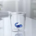 Transparent glass cup with 3D blue whale interior design, heat resistant milk breakfast mug - Whale