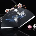 Chinese style folding hand fan with elegant deer moon pattern and black bamboo handle. - Mountain Deer / 18cm