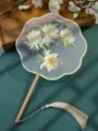 Chinese style embroidered round fan featuring white floral embroidery and tassel variant - Double-Sided Embroidered Eight-Petal Fan "Epiphyllum" with Beechwood Handle
