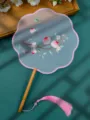 Traditional Chinese embroidered round fan with peach blossom design and pink tassel - Double-Sided Embroidered 8-Petal Fan - Peach Luck with Wooden Handle