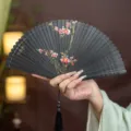 Chinese style black folding bamboo fan with hand-painted plum blossom and tassel for dance - Black Blooming Red Plum