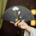 Black carved hollow bamboo folding fan, traditional Chinese style lotus painting fan. - Black Kingfisher and Lotus
