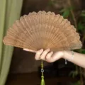 Natural green sandalwood folding fan traditional Chinese hollow carved craft hand fan gift - Qiye Green Sandalwood