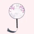 Chinese style round hand fan with wooden handle and tassel for Hanfu photography. - Peach Blossoms Aflame Black Handle