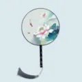 Traditional Chinese round fan with lotus painting, wooden handle and grey tassel variant. - Lotus Tinted - Black Handle
