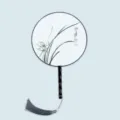 Traditional Chinese round fan with wooden handle, ink painting orchid pattern and grey tassel. - Elegant Orchid - Black Handle