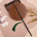 Éventail rond en bambou Hanfu avec long manche noir et gland vert, accessoire rétro. - Rond
