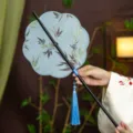 Traditional Chinese style bamboo waist fan with blue tassel, elegant Hanfu round fan accessory. - 8-Petal Blue Bamboo Leaves Waist Fan (Bamboo Edge)