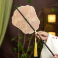 Chinese traditional style Hanfu round fan with bamboo handle and yellow tassel variant - Phoenix Crown Golden Face Waist Fan (Bamboo Edge)