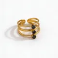 Close-up detail of a stunning gold stainless steel multi-band open ring with black zirconia. - Open Adjustable / Gold Black Square Stone