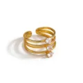 Exquisite gold-tone multi-band open ring featuring three sparkling cubic zirconia stones detail. - Open Adjustable / Gold Clear Round Stone