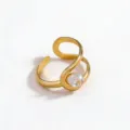 Detailed view of a gold open ring with a sparkling clear zircon and elegant curved design. - Open Adjustable / Gold Color White Zirconia