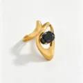 Detailed view of gold stainless steel ring featuring an elegant black oval zircon stone. - Black Oval