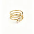Detailed closeup of multi-layer gold ring sparkling zirconia crystal luxury stackable design - Transparent Multi-Layer