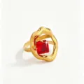 Detailed close-up of a stylish gold-tone irregular ring featuring a sparkling red square zircon stone. - Red Rectangle