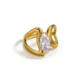 Detailed closeup view of a polished gold plated brass ring showcasing a clear marquise zircon. - White Oval Rhinestone Style(DQ-3454-1) / Open Adjustable / Gold