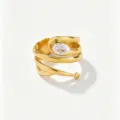 Close-up detail of multi-layer wrap 18k gold plated stainless steel ring with oval zircon. - Open Adjustable / White