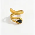 Detailed shot of gold-plated stainless steel wrap ring with black zircon for women fashion jewelry. - Open Adjustable / Black