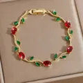 Exquisite gold plated zircon rose vine bracelet with stunning red and green stones detail. - 20cm / DQ-W-4091-3
