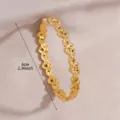 Gold stainless steel interlocking heart bracelet detail view showing fine craftsmanship. - Hollow Heart Chain