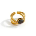 Gold stainless steel open ring featuring a sleek multi-strand design and a dark central zirconia stone. - Multi-layer Oval Style (DQ-W-3437-1)