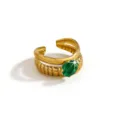 Gold plated stainless steel ring detail shot with green oval zirconia gemstone open band. - Vertical Stripe Oval Style (DQ-W-3440-1)