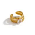 Gold stainless steel double band open ring detail featuring sparkling oval zircon stone. - Vertical Stripe Oval Style (DQ-W-3440-2)