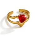 Detailed close-up view of a gold-plated open ring featuring a red heart-shaped zircon. - Wave Heart Style (DQ-W-3442-1)