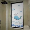 Frosted glass privacy window film featuring a cute blue whale cartoon design for bathroom - Static Cling (Blackout) (BLT-060) / 30*60cm