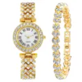 Elegantes goldfarbenes Damen-Uhrenset mit Strasssteinen und Herz-Armband für schicken Stil. - Uhren- und Armband-Set / Gold