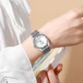 Elegant silver ladies quartz watch with diamond bezel and five-bead link bracelet - White Dial Silver Case