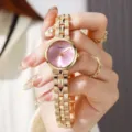 Elegante goldene Damen-Quarzarmbanduhr mit einem schicken rosa Zifferblatt - Gold Rosa