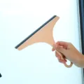 Household glass window cleaning squeegee tool with comfortable grip for daily home use. - Nordic Pink