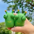 Cute green worm squeeze toy with popping eyes, fun stress relief fidget toy for fun and relaxation. - Little Cabbage Worm