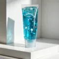 Portable stress relief slow rebound toy with blue liquid glitter stars for relaxation. - Blue