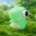 Cute green dinosaur squeeze toy with popping eyes, fun fidget toy for stress relief and relaxation. - Pop-out Eyes T-Rex