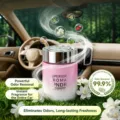 Car air freshener detail view, pink gradient jar with silver lid placed among white flowers. - Gardenia Purple