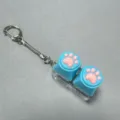 Cute cat paw switch tester keychain in blue and pink, perfect mechanical keyboard toy. - Two-Button Transparent Shell - Blue Silicone Cat Paw (Snake Chain) - No Light