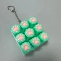 Silicone cat paw decompression keychain, 3x3 grid mechanical switch fidget toy in green. - 9-Key Green Shell Green Silicone Cat Paw Fidget (Snake Chain) - No Light