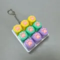 Colorful silicone cat paw fidget toy keychain, stress relief switch tester pendant. - 9-Key White Shell Silicone Cat Paw Fidget (Yellow/Green/Purple) Snake Chain - No Light