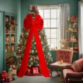 Detailed view of a giant red velvet Christmas tree bow with long streamers for holiday decor. - Long Ribbons 50x180cm / Red