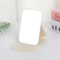 Portable folding PU leather desktop makeup mirror, solid color compact cosmetic mirror for daily use - Creamy White