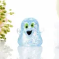 Cute Halloween ghost squishy toy, slow rising glitter stress relief toy detail view. - Blue
