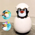 Cute baby bath toy, penguin egg water spray shower sprinkler for toddler bathroom water fun playtime. - Penguin