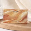 Solid car and home balm air freshener in elegant gold design, long-lasting sweet osmanthus fragrance. - Osmanthus