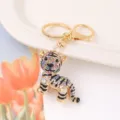 Colorful rhinestone tiger keychain close-up, glittering crystal metal pendant detail. - Tiger 2